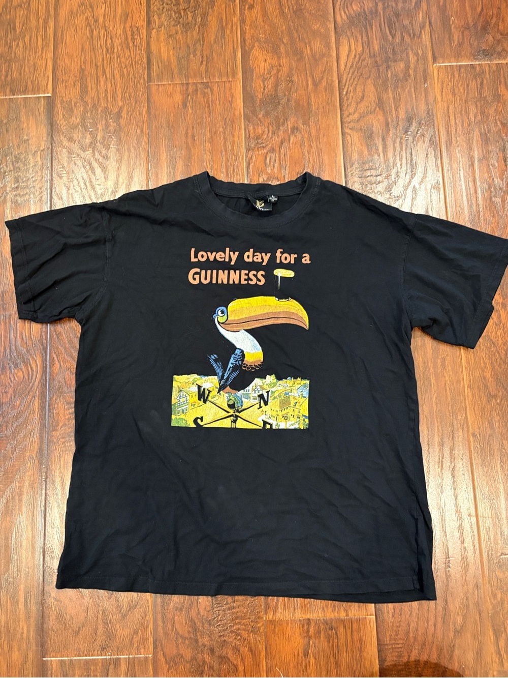 Guinness Black Tee with Yellow & Orange Toucan Graphic